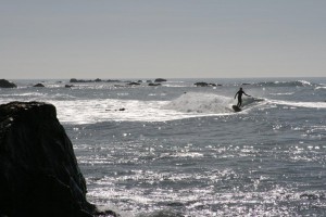 Surfers enjoying the waves on Moonstone Beach in Cambria